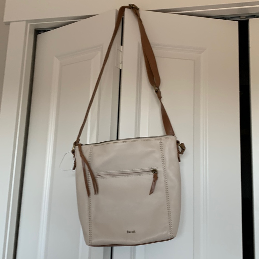 “The Sak” ivory and beige leather purse